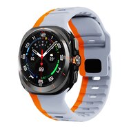 Wave siliconen bandje - Grijs met oranje - Samsung Galaxy Watch Ultra 47mm